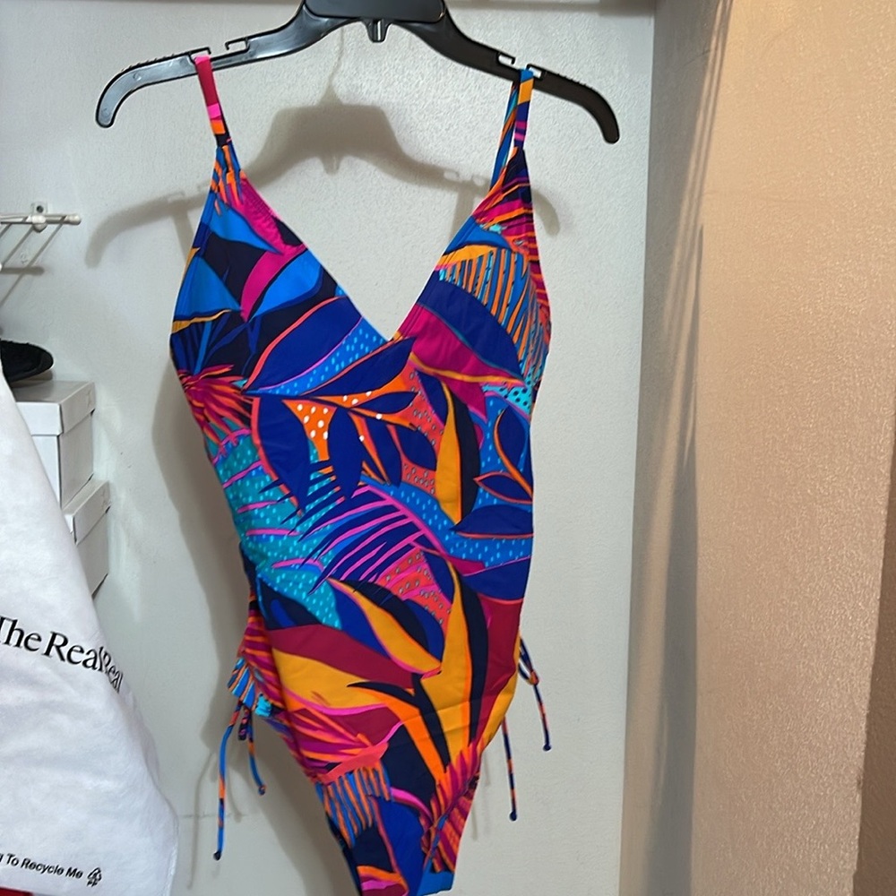 Vibrant Blue and Orange One Piece Swimsuit with Playful Details
